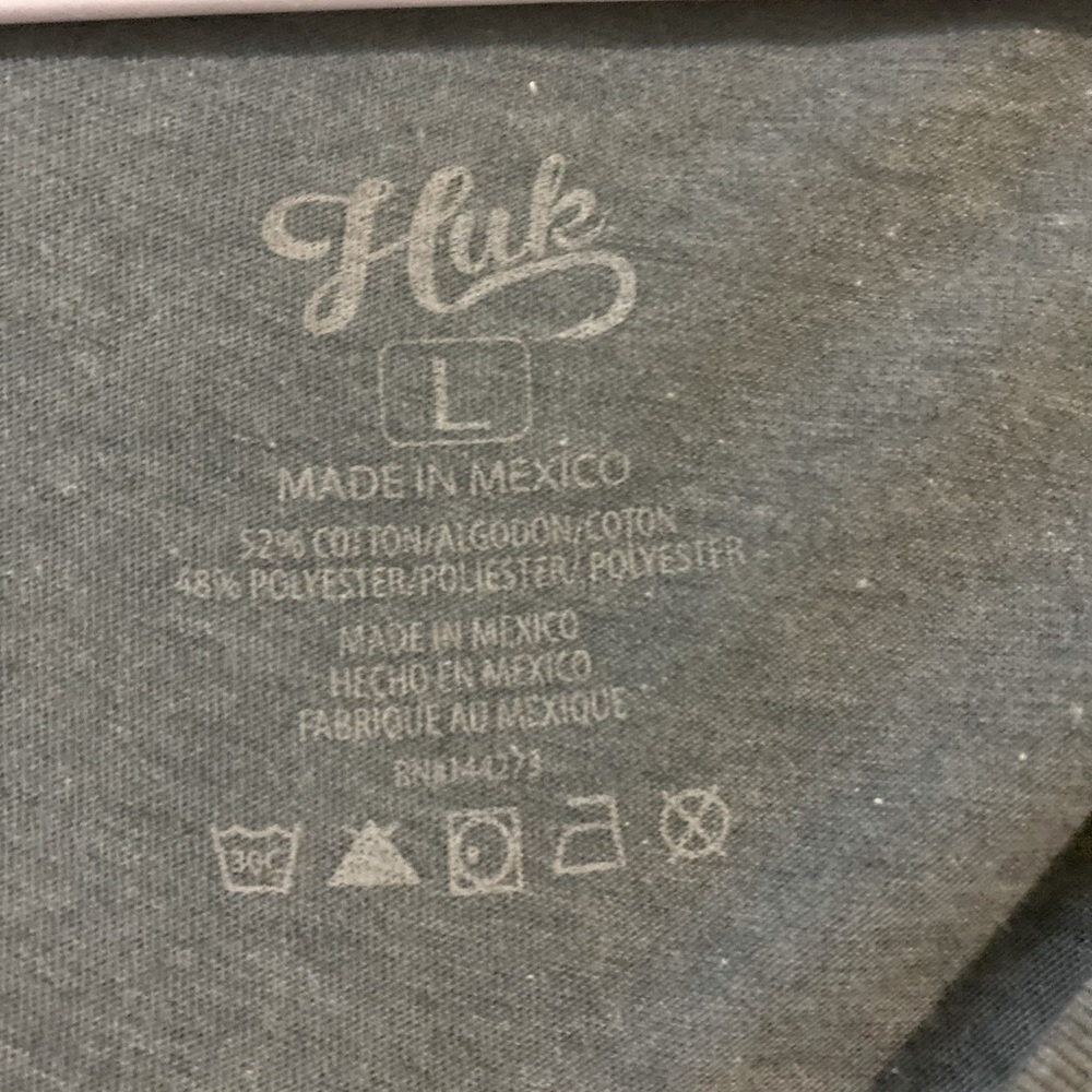 Ladies size large HUK Vneck top